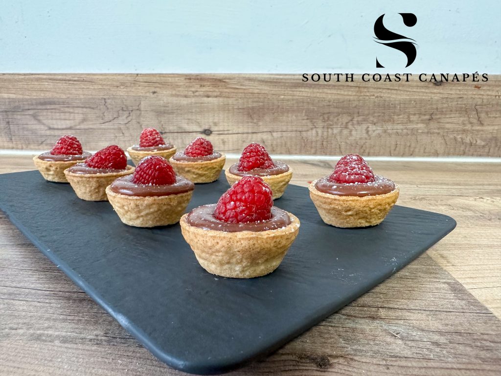 Milk chocolate ganache and raspberry tart