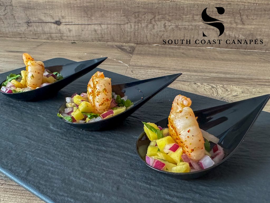 Prawn and mango salad spoons