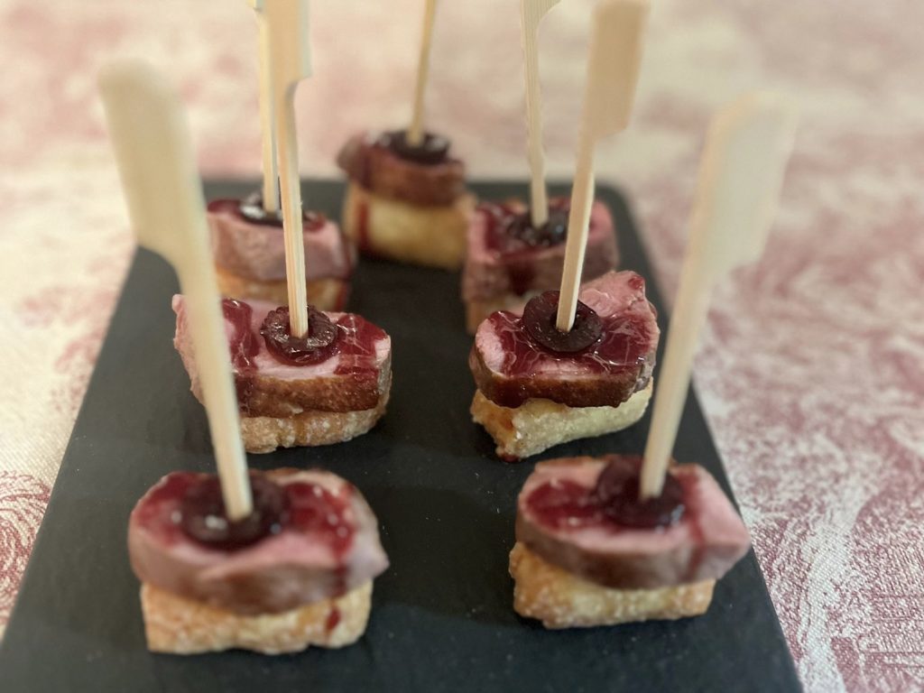 Venison, halloumi, cherry and cherry sauce
